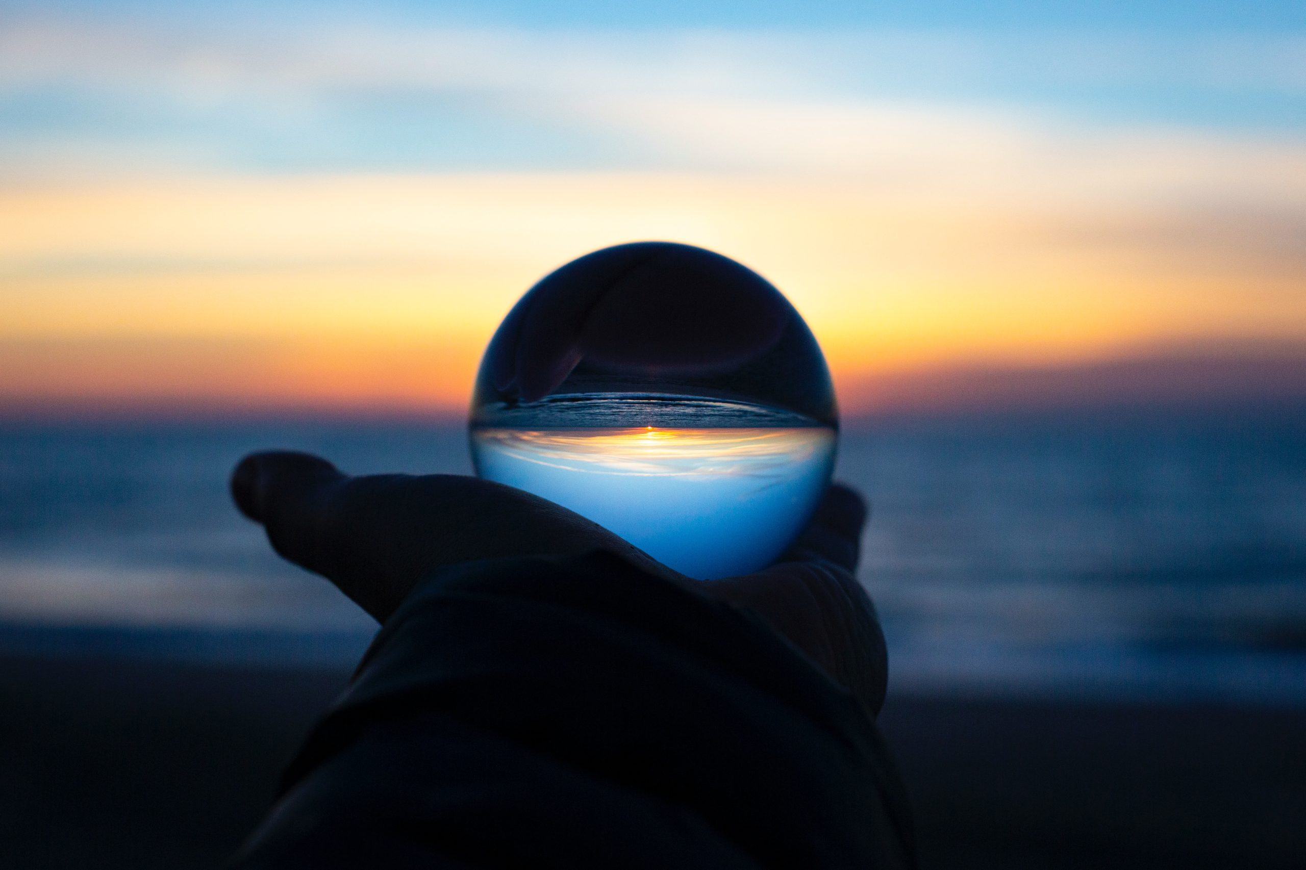 Glass sphere on horizon - AI Sustainable Future